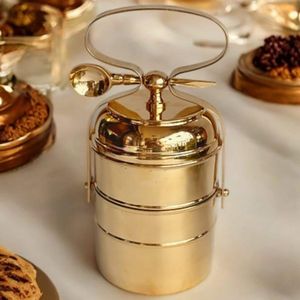 Sturdy brass tiffin <b>box</b> with leakproof locking system ensuring meals stay warm fresh and separated while carrying to office - Product Image 2