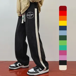 Gevşek özel Sweatpants pamuk elastik kemer yan şerit Patchwork spor spor uzun düz geniş bacak koşu pantolonları erkek