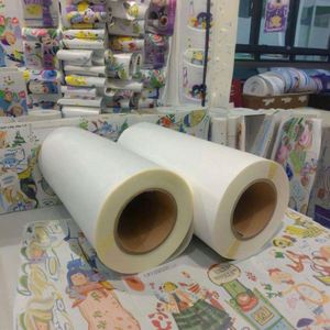 ฟิล์ม PET DTF แบบม้วน ขนาด 60 ซม. A3 สำหรับเครื่องพิมพ์ดิจิตอลอิงค์เจ็ท พิมพ์ลายเสื้อยืด  แบบลอกได้ทั้งร้อนและเย็น  ผิวด้านสองด้าน - Product Image 4