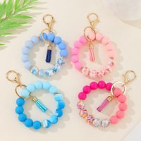 Bracelet en silicone fait main marguerite, pendentif porte-monnaie, breloque porte-clés anti-perte, style américain, le plus vendu