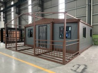 Mini-maison préfabriquée modulaire pour une vie compacte, idéale comme maison d'hôtes, bureau ou logement.
