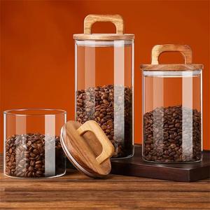 Bocaux et bouteilles de rangement cylindriques en verre borosilicate transparent avec couvercles en bois – Design multifonctionnel et écologique pour la cuisine - Product Image 2