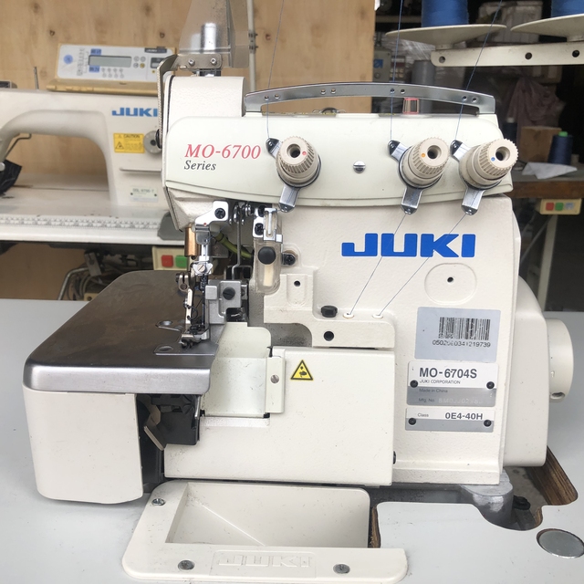 Original Used JUKI-MO-6714S 4 Thread Overlock Sewing Machine in Good Condition