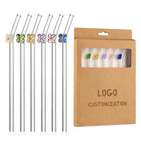 Vente en gros de paille en verre écologique et réutilisable de 8*200mm paille en verre design fleur colorée papillon paille transparente pliée pour jus