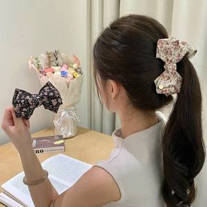 Élégante Pince à Cheveux Banane Rétro en Tissu à Nœud Floral pour Femme, Décoration Capillaire Décontractée, Accessoires Cheveux en Gros - Product Image 1