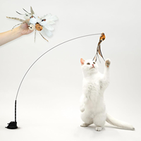 Jouet pour chat avec ventouse en plumes d'oiseaux naturelles pour jouer en intérieur sans les mains