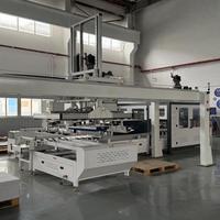 Machine d'emballage automatique industrielle pour un emballage efficace des boîtes et des lignes de production