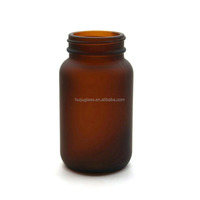 Pot à pilules pharmaceutique en verre transparent de 4oz 120ml Bouteille de médicament en verre à capsule ronde pour supplément sain avec bouchon à vis en métal