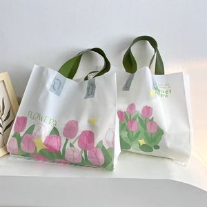 Lüks kullanımlık PE plastik alışveriş çantaları süpermarket ambalaj için renkli logolu çevre dostu parçalanmış giyim taşıyıcı - Product Image 1