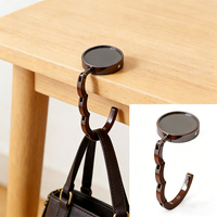 Crochets de table pliables portables en métal pour sacs à main, avec patins antidérapants, pour bijoux et accessoires, avec délai de production garanti