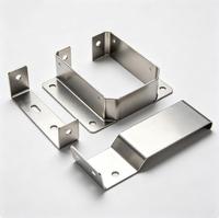 Produits de quincaillerie sur mesure, fabrication par emboutissage, matériaux de construction métalliques et autres pièces