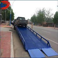Rampe d'entrepôt rampe de camion pour le chargement de camions plate-forme en acier portable quai de chargement rampe élévatrice de voiture fabriquée en Chine