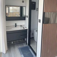 Mini-maison portable en structure acier préfabriquée, étanche, alimentée à l'énergie solaire, écologique, type Apple Pod, pour hôtel ou entrepôt modulaire