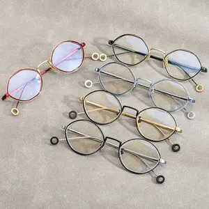 Montura de gafas de titanio puro a la moda hecha a mano montura de gafas redondas dúplex irregulares montura de gafas anti-luz azul