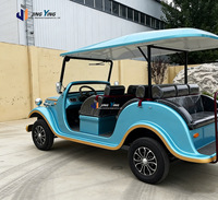 Voiturette de golf électrique classique rétro 8 places, véhicule de tourisme durable avec auvent de protection pour hôtels, stations balnéaires et transport en parc
