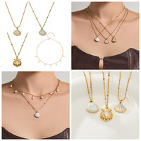 Colliers superposés dorés avec pendentif coquillage pour femme, bijoux fantaisie bohèmes de plage, chaîne délicate et élégante