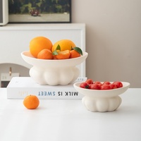 Assiettes ovales en céramique nordique transfrontalière, assiettes à dîner solides, plateaux de rangement pour fruits avec design à pied haut pour table basse de salon