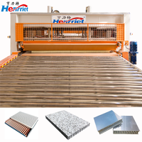 Machine de laminage à chaud entièrement automatique pour la production de panneaux composites en aluminium alvéolaire pour revêtements de plafond