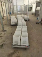 Chariot à mailles métalliques à quatre roues pour pot de fleurs pour marché aux enchères Wagon de transport robuste pour grandes plantes en pot OEM