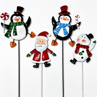 Ensemble fantaisie de 4 décorations de jardin en métal en forme de pingouin, Père Noël, bonhomme de neige et canne à sucre pour extérieur, pelouse et porche