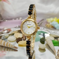 Nuevo reloj de pulsera con incrustaciones de diamantes para mujer, estilo retro, resistente al agua, de alta gama, estilo exclusivo.