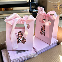 Sacs shopping en papier rose de luxe personnalisés avec votre propre logo pour l'emballage de cosmétiques et de vêtements