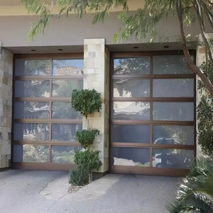 Cadre en alliage d'aluminium noir automatique moderne Panneau en verre trempé givré Portes <span class=keywords><strong>de</strong></span> <span class=keywords><strong>garage</strong></span> sectionnelles étanche français <span class=keywords><strong>pour</strong></span> usage domestique - Product Image 1