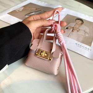 Mini llavero de cuero platino con colgante multifunción portátil para bolso, nuevo llavero para lápiz labial, auriculares y mini bolso - Product Image 5