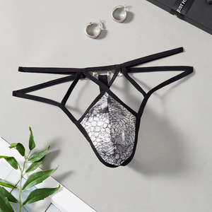 Tanga de encaje negro de talle bajo Ding Zhi Mei para hombre, ropa interior sexy para hombres gay, estilo tentación. - Product Image 1
