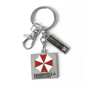 Nuevas llegadas Resident <span class=keywords><strong>Evil</strong></span> llaveros de metal al por mayor paraguas coche llavero película Logo llavero promocional Accesorios - Product Image 5
