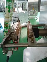 Machine de remplissage automatique électrique en acier inoxydable pour sachets d'eau, sacs en plastique et pochettes, pour applications dans l'industrie des boissons et des produits chimiques