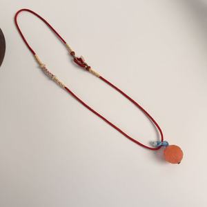 Chaîne de pull en agate rouge tissée à la main, artisanat de Suzhou, cadeau du Nouvel An lunaire 2026 pour <span class=keywords><strong>femme</strong></span>, origine Chine - Product Image 1