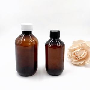 Bouteille en plastique ronde transparente Boston Brown pour shampoing 500ml 750ml 1000ml avec pompe distributrice noire - Product Image 1