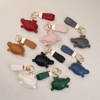 Porte-clés en cuir élégant et luxueux, vente en gros, breloques pour sacs, porte-clés pour clés de voiture, décoration pour sacs à main et sacs à dos, cadeau