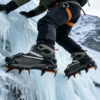 Crampons à glace et neige antidérapants 12 dents type griffe de tigre, couvre-chaussures à pointes en acier et TPU pour traction hivernale