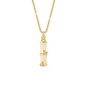 Collier pendentif tendance en acier inoxydable plaqué or avec moulage bambou et zircon serti clos pour bijoux de mode féminins en gros - Product Image 1
