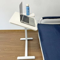 Table de lit roulante pneumatique en métal pour mobilier hospitalier avec plateau inclinable, design moderne pour usage patientiel dans les écoles et les chambres