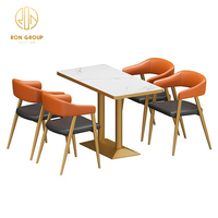 Ensemble de meubles de café et de restaurant en marbre, banquette, table avec chaises pour restaurant, café, salon de thé