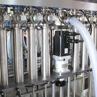 Machines de remplissage et de bouchage automatiques d'huile comestible de bonne qualité, machine de remplissage linéaire d'huile, machine de remplissage linéaire de liquides