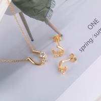 Parure de bijoux fantaisie en argent sterling 925 plaqué or 18 carats avec boucles d'oreilles et collier en moissanite en forme de U pour femmes et jeunes filles