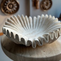 Lavabo à main en marbre naturel en forme de coquille, surface solide ronde, avec un design contemporain et écologique pour les comptoirs et les meubles-lavabos