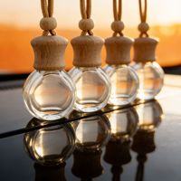 Vente en gros de diffuseurs d'arômes pour voiture vides de 10 ml, flacon diffuseur de parfum pour voiture en verre transparent avec couvercle en bois