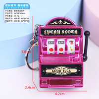 Vente en gros usine : Porte-clés mini machine à sous, pendentif jouet rotatif fruits porte-bonheur, breloque de sac fantaisie en vrac, thème jeu