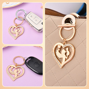 Porte-clés en forme <span class=keywords><strong>de</strong></span> <span class=keywords><strong>baiser</strong></span> d'<span class=keywords><strong>ange</strong></span> avec sacs en organza et étiquettes, parfaits pour les cadeaux <span class=keywords><strong>de</strong></span> fête prénatale, mariages, enterrements <span class=keywords><strong>de</strong></span> vie <span class=keywords><strong>de</strong></span> jeune fille et baptêmes - Product Image 3