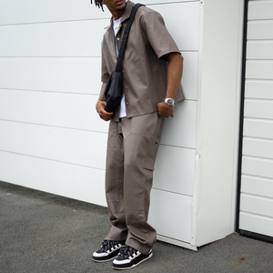 Set di <span class=keywords><strong>abbigliamento</strong></span> da <span class=keywords><strong>uomo</strong></span> di <span class=keywords><strong>tendenza</strong></span> calda estiva in maglia di nuova moda camicia Casual tinta unita e pantaloni che vendono vestiti in due pezzi - Product Image 6