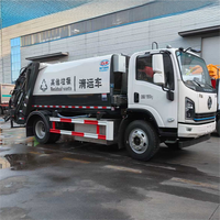 Camion à ordures compacté à énergie nouvelle, alimenté par batterie, SHACMAN 4*2, fabriqué en Chine.