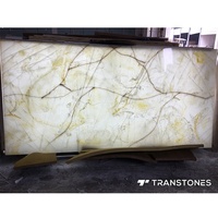 Panneau en résine d'albâtre rétro-éclairé pierre frittée Panneau mural intérieur en onyx blanc translucide Faux brique brillante de 6mm d'épaisseur