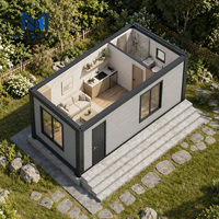Maison conteneur moderne à assemblage rapide, en kit, avec structure en acier et verre trempé, extérieur gris, maisonnette préfabriquée pour la campagne