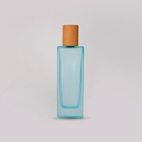 Bouteille de parfum en verre rectangulaire multicolore vide de 50ml avec des bouteilles de parfum vides rectangulaires d'atomiseur de couvercle avec des chapeaux en bambou