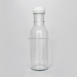 Contenitore all'ingrosso di vetro rotondo chiaro alla moda con coperchio filettato per salse sciroppi marmellate frullati e bevande - Product Image 4